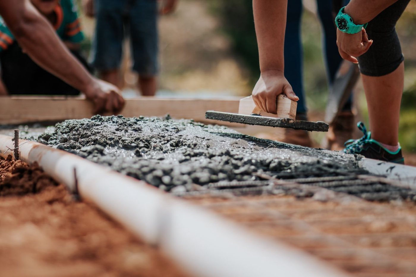 Concrete slab being poured at a house construction site in Kharar